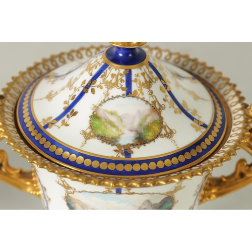 112 - A FINE PAIR OF ROYAL CROWN DERBY CAMPANA SHAPED TWO-HANDLED PEDESTAL VASES AND COVERS with richly gi... 