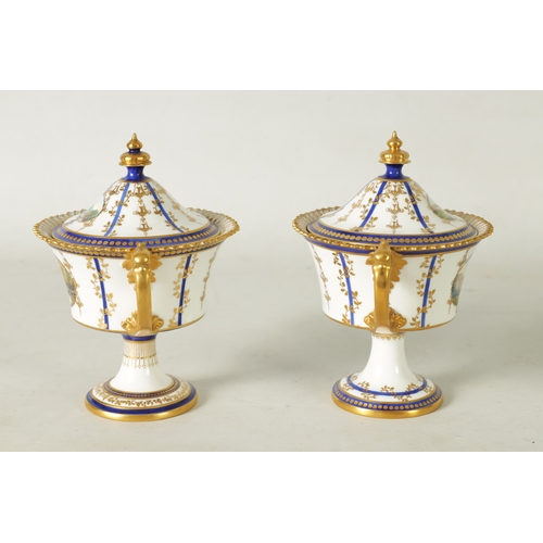 112 - A FINE PAIR OF ROYAL CROWN DERBY CAMPANA SHAPED TWO-HANDLED PEDESTAL VASES AND COVERS with richly gi... 