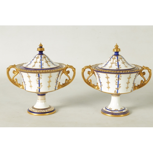 112 - A FINE PAIR OF ROYAL CROWN DERBY CAMPANA SHAPED TWO-HANDLED PEDESTAL VASES AND COVERS with richly gi... 