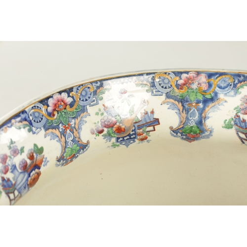 113 - A LARGE 19TH CENTURY CANTON GROUP CERAMIC FOOT BATH, of bulbous form with printed floral design and ... 