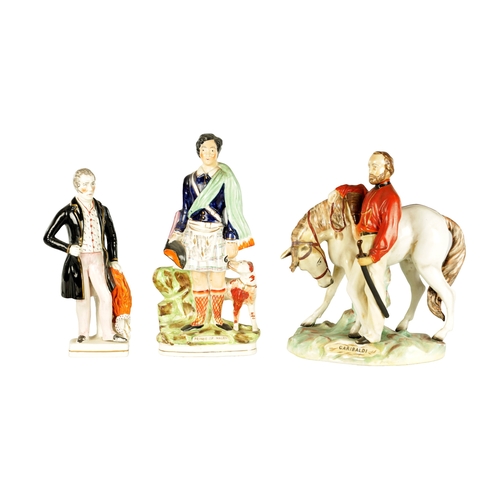 114 - THREE 19TH CENTURY STAFFORDSHIRE FIGURES of Garibaldi, Prince of Wales, and Wellington (39cm high )