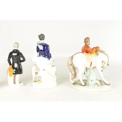 114 - THREE 19TH CENTURY STAFFORDSHIRE FIGURES of Garibaldi, Prince of Wales, and Wellington (39cm high )