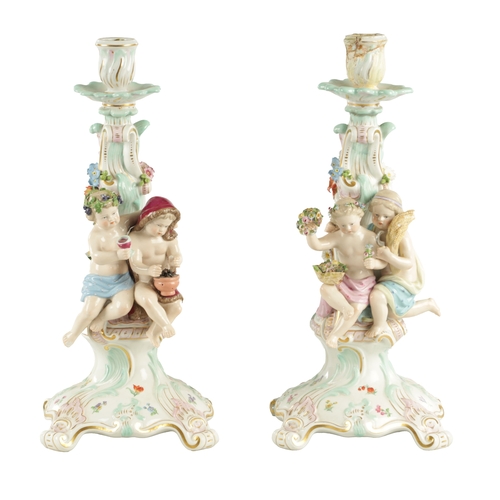 115 - A PAIR OF 19TH CENTURY MEISSEN PORCELAIN CANDELABRA with scrolled branch work supports having mounte... 