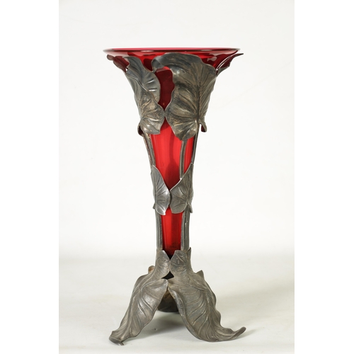 12 - A STYLISH ART NOUVEAU PEWTER AND CRANBERRY GLASS ORCHID VASE the lift-out trumpet-shaped glass body ... 