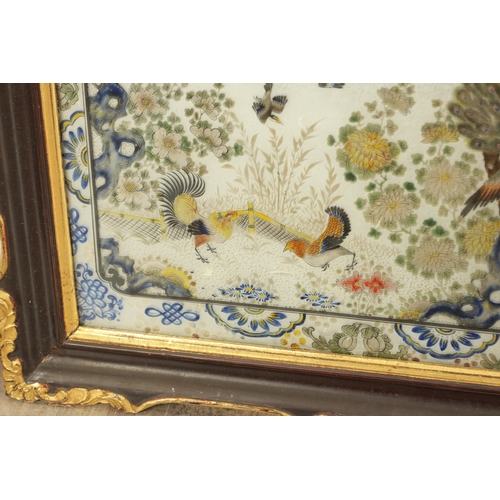 121 - A PAIR OF 19TH CENTURY CHINESE REVERSE PAINTED LANDSCAPE SCENES ON GLASS WITH MIRRORED EFFECT depict... 