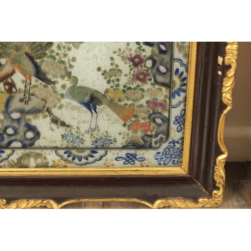 121 - A PAIR OF 19TH CENTURY CHINESE REVERSE PAINTED LANDSCAPE SCENES ON GLASS WITH MIRRORED EFFECT depict... 