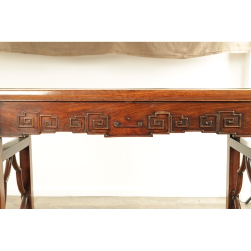 137 - A LATE 19TH CENTURY CHINESE HARDWOOD ALTAR TABLE POSSIBLY HUANGHUALI WOOD having a panelled top with... 