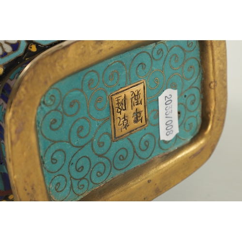 138 - A PAIR OF CHINESE CLOISONNE ENAMEL MOON FLASKS with dragon handles and geometric borders enclosing c... 