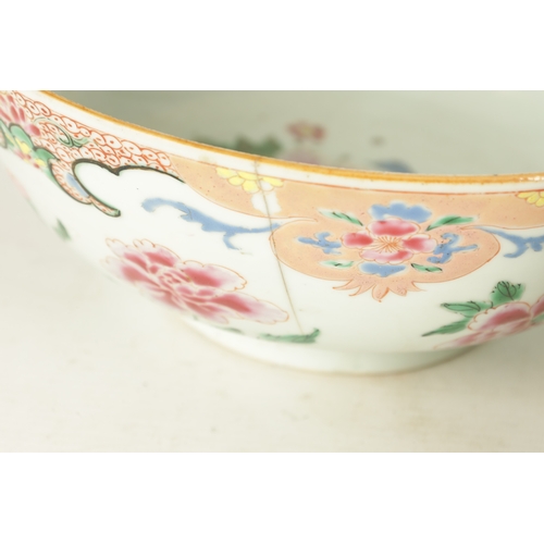 144 - TWO 18TH CENTURY CHINESE PORCELAIN BOWLS decorated with coloured floral decoration (23.5cm and 22.5c... 