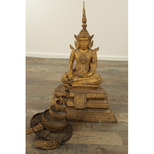 151 - A LARGE 19TH CENTURY GILT METAL TIBETAN BUDDHA with canopy and stepped base (85cm high )