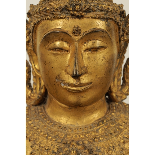 151 - A LARGE 19TH CENTURY GILT METAL TIBETAN BUDDHA with canopy and stepped base (85cm high )