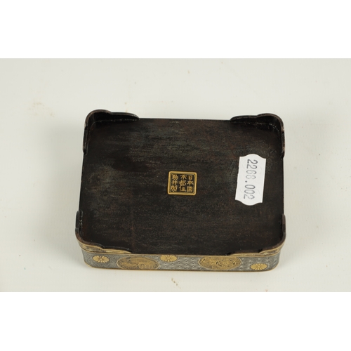 152 - A FINE JAPANESE MEIJI GILT AND SILVERED IRONWORK BOX BY KOMAI the lift-off lid with a finely engrave... 