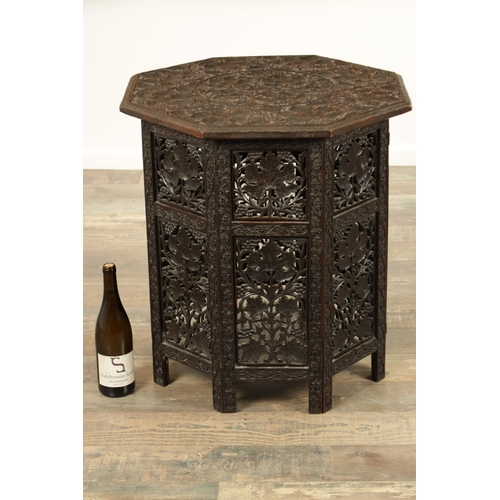 153 - A GOOD 19TH CENTURY INDIAN CARVED HARDWOOD OCTAGONAL CENTRE TABLE with deep finely carved panelled l... 