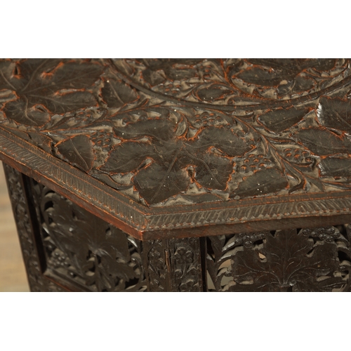 153 - A GOOD 19TH CENTURY INDIAN CARVED HARDWOOD OCTAGONAL CENTRE TABLE with deep finely carved panelled l... 