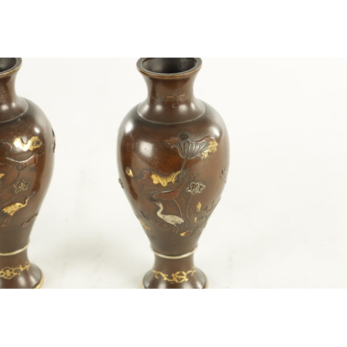 155 - A PAIR OF JAPANESE MEIJI PERIOD MIXED METAL BRONZE VASES finely decorated with birds amongst flowers... 