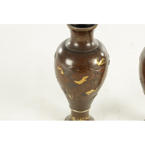 155 - A PAIR OF JAPANESE MEIJI PERIOD MIXED METAL BRONZE VASES finely decorated with birds amongst flowers... 