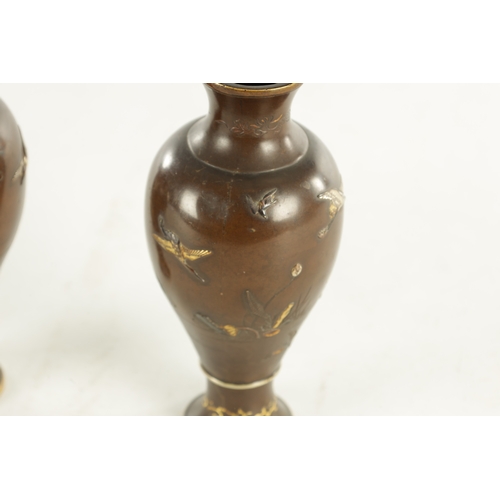 155 - A PAIR OF JAPANESE MEIJI PERIOD MIXED METAL BRONZE VASES finely decorated with birds amongst flowers... 