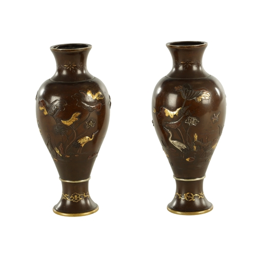 155 - A PAIR OF JAPANESE MEIJI PERIOD MIXED METAL BRONZE VASES finely decorated with birds amongst flowers... 