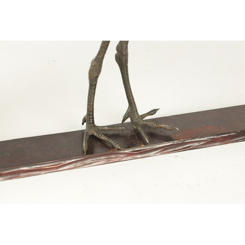 160 - A GOOD PAIR OF JAPANESE MEIJI PERIOD COLD PAINTED BRONZE SCULPTURES OF CRANES on hardwood bases (one... 