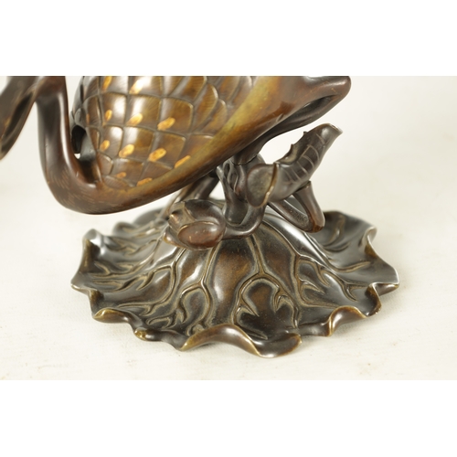 161 - A PAIR OF MEIJI PERIOD JAPANESE BRONZE AND MIXED METAL CENSERS modelled as two cranes perched on lil... 