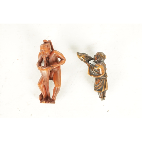 163 - TWO JAPANESE CARVED BOXWOOD NETSUKE comprising of two standing figures. (6.5cm high and smaller)