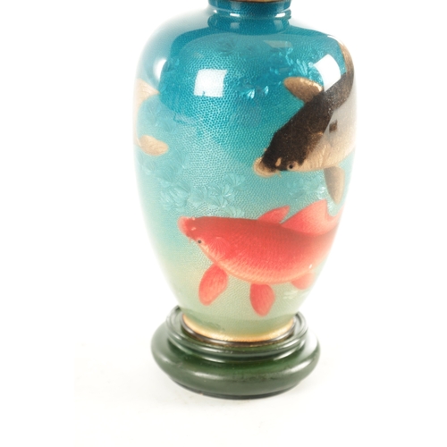 164 - A JAPANESE MEIJI PERIOD CLOISONNÉ ENAMEL VASE DECORATED WITH CARP on a blue ground bearing signature... 