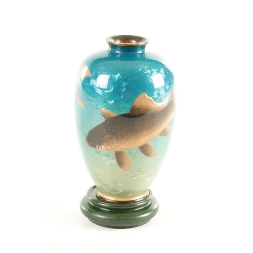 164 - A JAPANESE MEIJI PERIOD CLOISONNÉ ENAMEL VASE DECORATED WITH CARP on a blue ground bearing signature... 