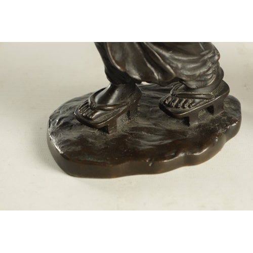 165 - A JAPANESE MEIJI PERIOD BRONZE SCULPTURE OF A GEISHA with seal mark signature to base (31cm high )