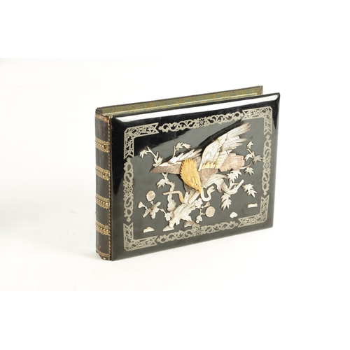 177 - AN EARLY 20TH CENTURY CHINESE POSTCARD ALBUM with lacquerwork and mother of pearl relief inlaid fron... 