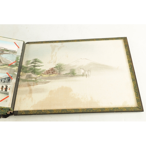 177 - AN EARLY 20TH CENTURY CHINESE POSTCARD ALBUM with lacquerwork and mother of pearl relief inlaid fron... 