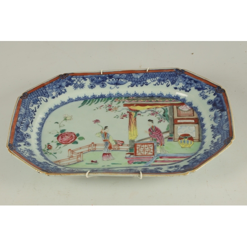 178 - AN 18TH CENTURY CHINESE FAMILLE ROSE CLIPPED RECTANGULAR DISH the blue scrolling foliated border dec... 