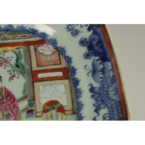 178 - AN 18TH CENTURY CHINESE FAMILLE ROSE CLIPPED RECTANGULAR DISH the blue scrolling foliated border dec... 