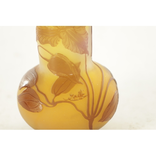 18 - A SIGNED EMILE GALLE CAMEO ART GLASS CABINET VASE. the bulbous body and cylindrical neck overcarved ... 