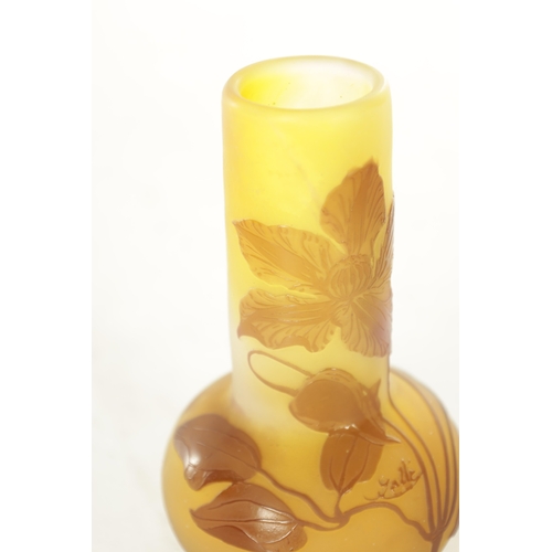 18 - A SIGNED EMILE GALLE CAMEO ART GLASS CABINET VASE. the bulbous body and cylindrical neck overcarved ... 