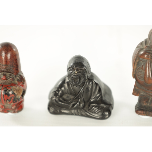 191 - THREE JAPANESE CARVED BOXWOOD NETSUKE one with polychrome painted finish. (5cm high and smaller)