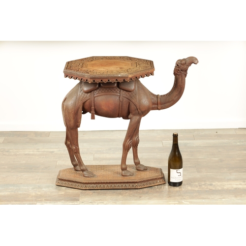 193 - A GOOD LATE 19TH CENTURY CARVED HARDWOOD ANGLO INDIAN OCCASIONAL TABLE modelled as a camel with leaf... 