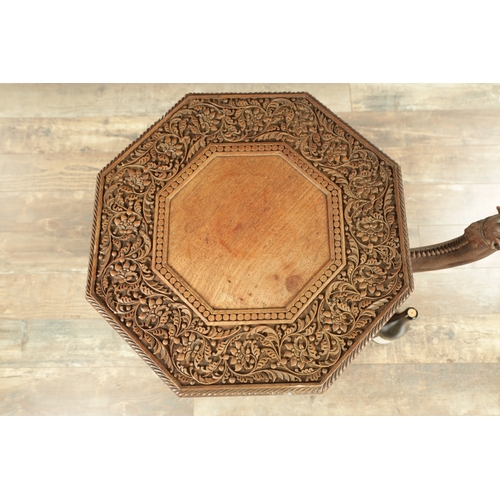 193 - A GOOD LATE 19TH CENTURY CARVED HARDWOOD ANGLO INDIAN OCCASIONAL TABLE modelled as a camel with leaf... 