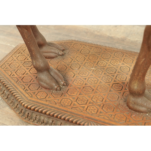 193 - A GOOD LATE 19TH CENTURY CARVED HARDWOOD ANGLO INDIAN OCCASIONAL TABLE modelled as a camel with leaf... 