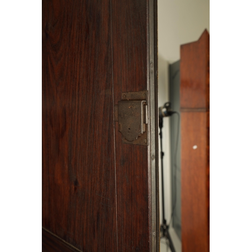 194 - AN EARLY 19TH CENTURY ANGLO INDIAN HARDWOOD SECRETAIRE CABINET ON CHEST with moulded cornice above a... 