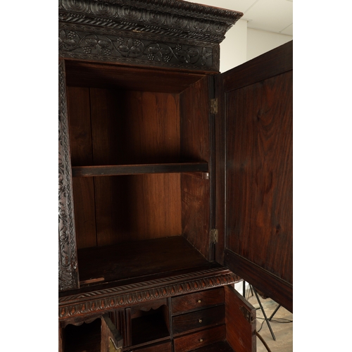 194 - AN EARLY 19TH CENTURY ANGLO INDIAN HARDWOOD SECRETAIRE CABINET ON CHEST with moulded cornice above a... 