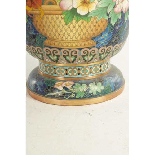 202 - A HIGHLY DECORATIVE AND COLOURFUL CHINESE CLOISONNE WARE HALL VASE with floral and geometric banded ... 