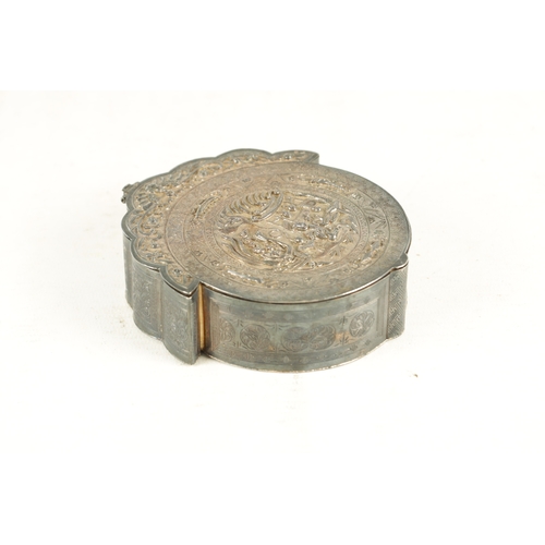 220 - A 19TH CENTURY CHINESE SILVER LIDDED DRESSING TABLE BOX of circular form with a floral crested bat m... 