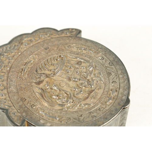 220 - A 19TH CENTURY CHINESE SILVER LIDDED DRESSING TABLE BOX of circular form with a floral crested bat m... 