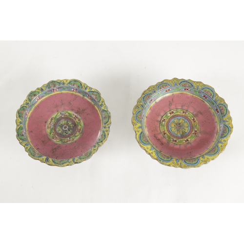 221 - A PAIR OF CHINESE FAMILLE VERTE STEM CUPS with scalloped edge rims, tapering stems decorated in brig... 