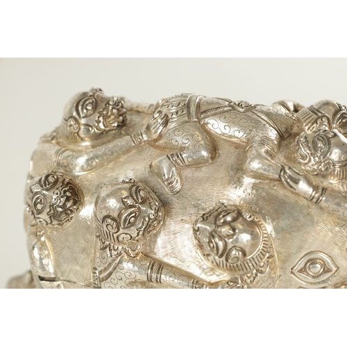 222 - A PAIR OF LATE 19TH CENTURY INDIAN SILVER SCULPTURES OF ELEPHANTS with relief moulded figures; raise... 