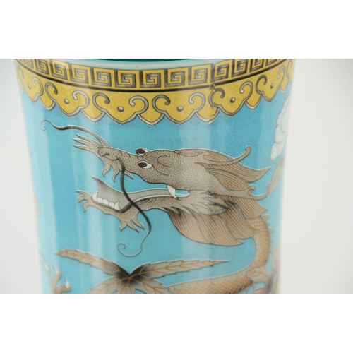 226 - A LARGE CHINESE BULBOUS DRAGON VASE WITH SLENDER NECK pale blue ground with scrolled leaf decorated ... 