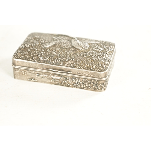 227 - A JAPANESE MEIJI PERIOD PEWTER LIDDED BOX with Eagle amongst flowering trees to the lid and pagoda t... 