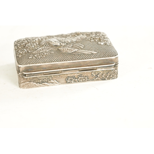 227 - A JAPANESE MEIJI PERIOD PEWTER LIDDED BOX with Eagle amongst flowering trees to the lid and pagoda t... 