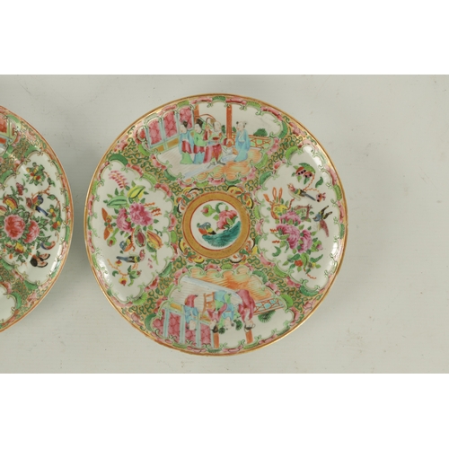 228 - TWO 19TH CENTURY FAMILLE ROSE CANTONESE PLATES decorated with panels of figures and birds amongst fl... 