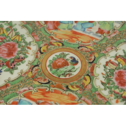 228 - TWO 19TH CENTURY FAMILLE ROSE CANTONESE PLATES decorated with panels of figures and birds amongst fl... 